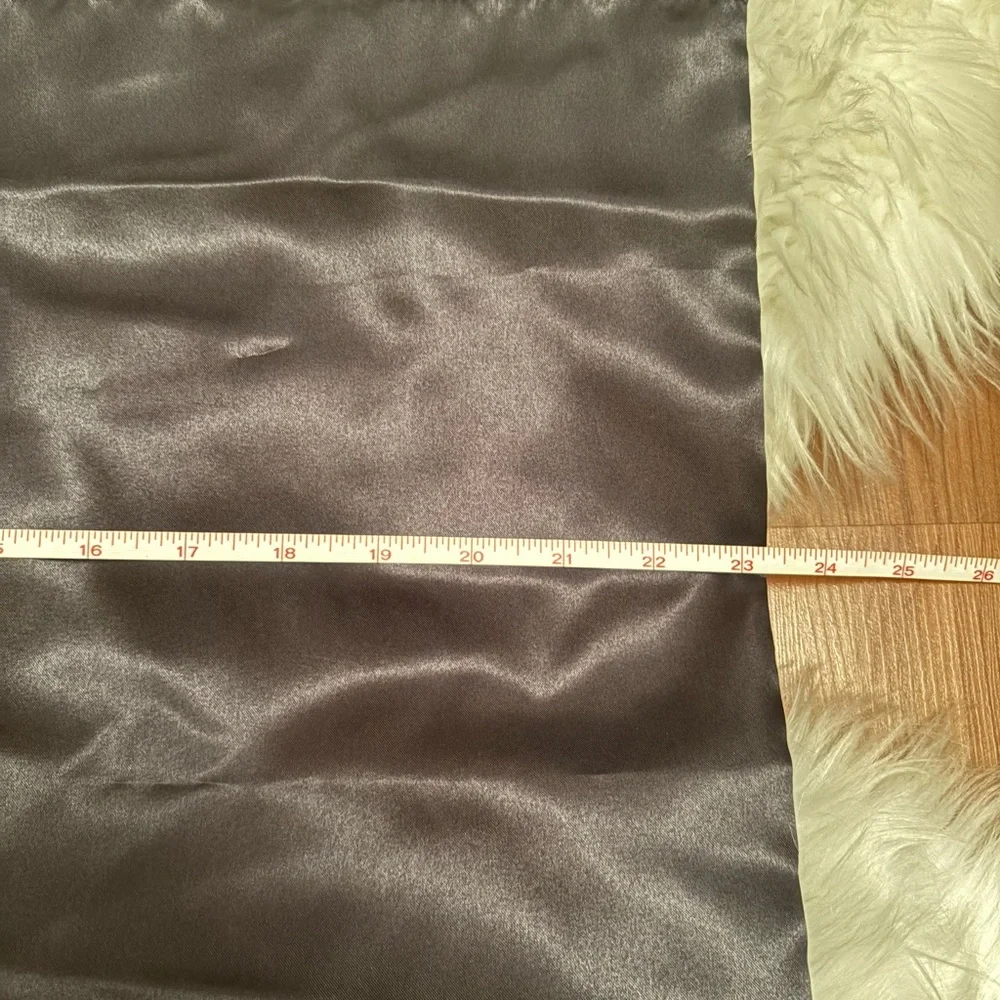 Black silky dust bag drawstrings